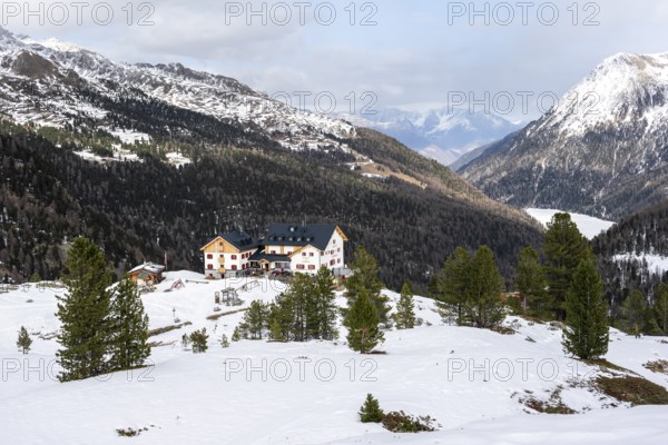 Zufallhütte mountain hut, view of the Martell Valley, snow-covered mountain landscape in winter, Ortler Alps, Vinschgau Valley, Italy, Europe