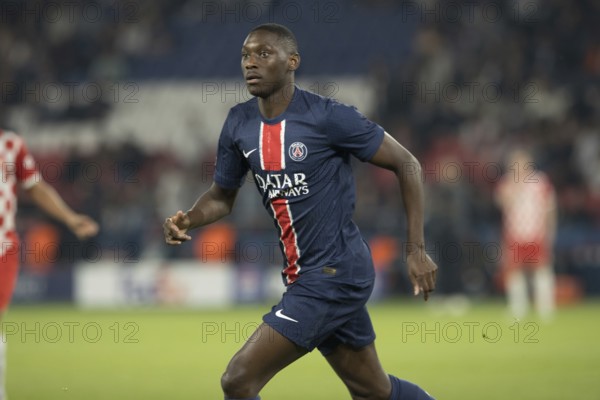 Football match, Randal KOLO MUANI Paris Saint Germain running to the left, Parc des Princes football stadium, Paris