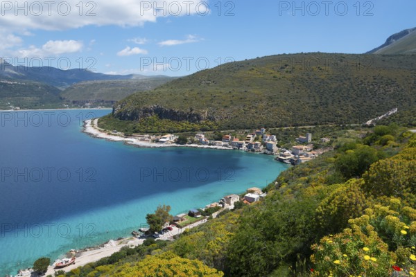 Stunning views of a coastline with beach and hills under a blue sky, Limeni, Areopoli, Laconia, Peloponnese, Greece, Europe