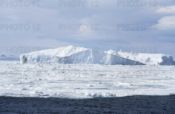 Ice Field with Iceberg in Antarctica