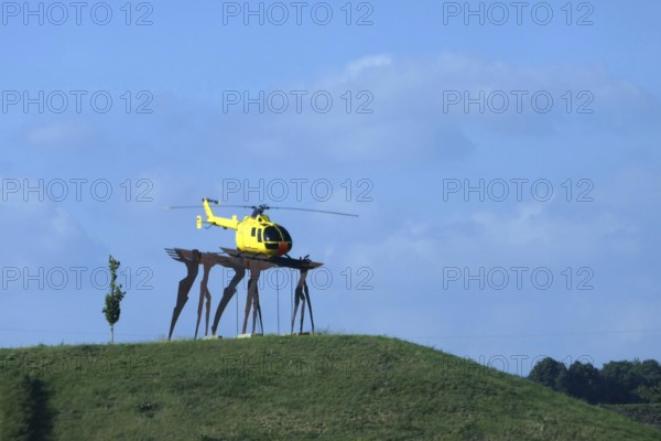 Yellow angel sculpture at the Kamen cross