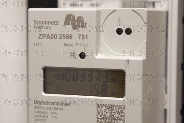 Symbolic image of energy costs in the household, digital electricity meter in a flat, operator Stromnetz Hamburg, Hamburg, Germany, Europe