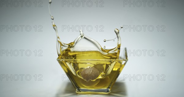 Green Olives, Olea europaea, Falling into a Jar