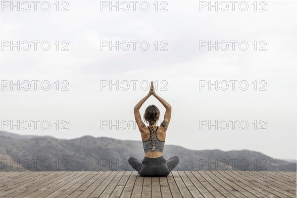 Back view of woman doing yoga outdoors Picture on pik. Resolution and high quality beautiful photo