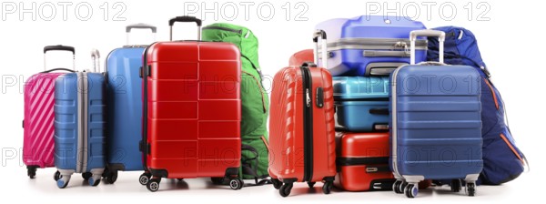 Luggage consisting of large suitcases and rucksacks isolated on white