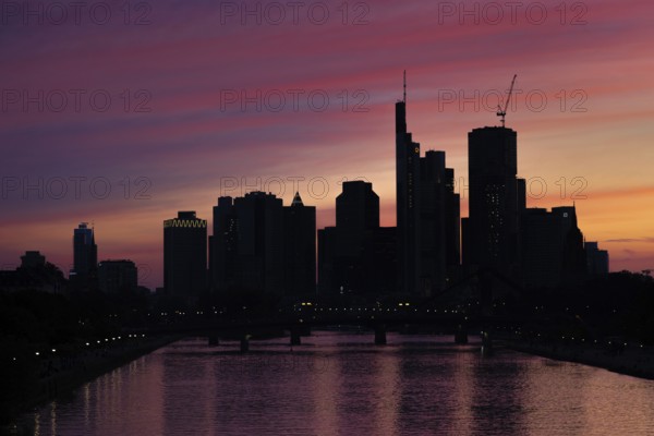 The sky above Frankfurt's banking skyline has changed colour after sunset, Frankfurt am Main, Hesse, Germany, Europe