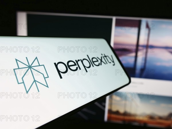 Stuttgart, Germany, 02-16-2024: Cellphone with logo of American artificial intelligence company Perplexity AI in front of business website. Focus on left of phone display, Europe