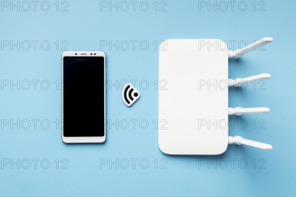 Top view wi fi router with smartphone. High resolution photo