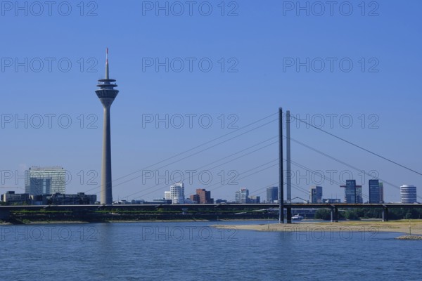 View over the Rhine with television tower and bridge, Düsseldorf, Germany, Europe
