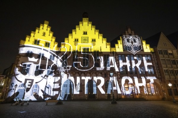To mark the 125th anniversary of Eintracht Frankfurt, a video installation on the façade of the Römer shows the club's history with its greatest sporting successes, Römerberg, Frankfurt am Main, Hesse, Germany, Europe