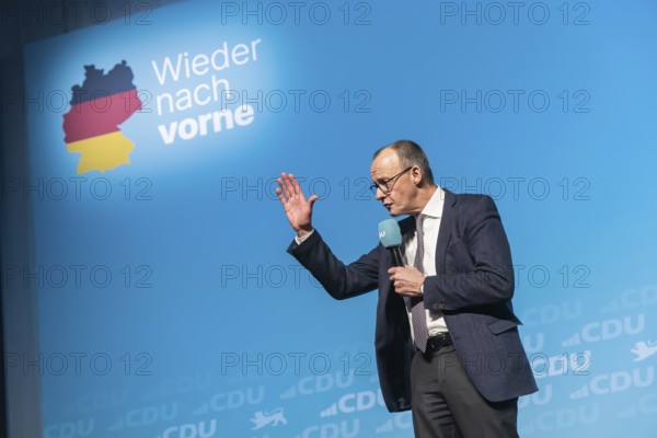 New Year's reception of the CDU with chancellor candidate Friedrich Merz in Künzelsau. The Federal Chairman of the CDU and Chairman of the CDU-CSU parliamentary group spoke to an audience of 2000 at the Carmen Würth Forum. Portrait during his speech on stage. Künzelsau, Baden-Württemberg, Germany, Europe