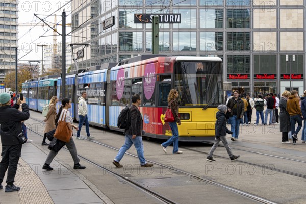 Street traffic with tram and pedestrians at Alexanderplatz in Berlin-Mitte, Berlin, Germany, Europe