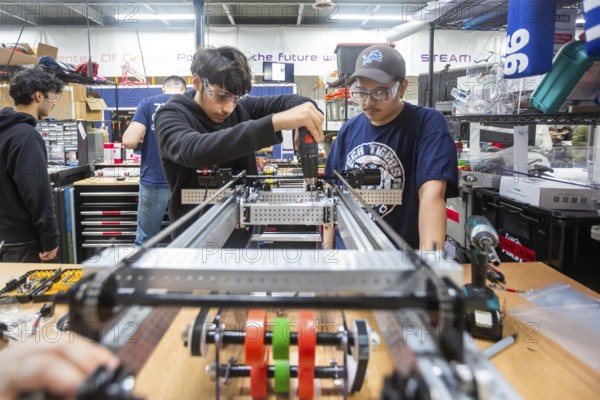 Detroit, Michigan - High school students build robots at the Detroit Hispanic Development Center's Robotics Engineering Center