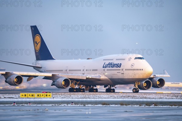 Lufthansa Boeing 747-8, on the taxiway to Runway West, Frankfurt FRA Airport, Fraport, in winter, Hesse, Germany, Europe