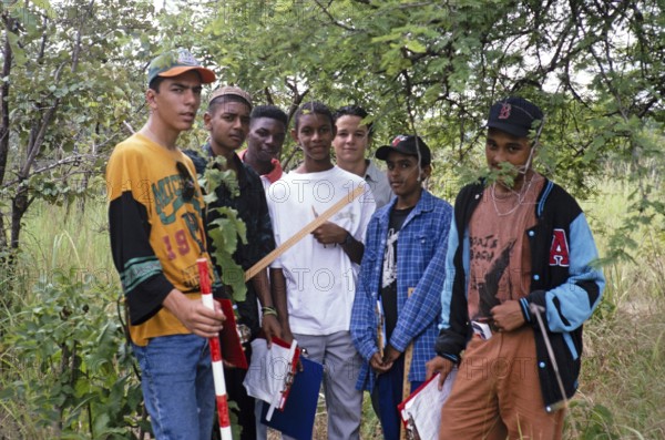 A group of young people from Central High International School conducting geographical fieldwork in a rural area, Malawi, Southern Africa 1996, Africa