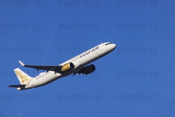 Aircraft climbing at the take-off at Fraport Airport. Aircraft registration: A9C-NH, Airbus A321, Gulf Air. Frankfurt am Main, Hesse, Germany, Europe
