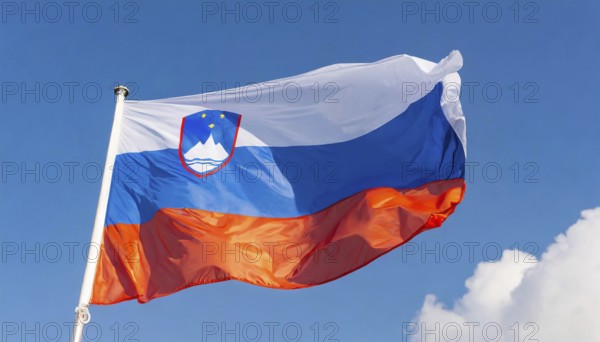 Flags, the national flag of Slovenia flutters in the wind