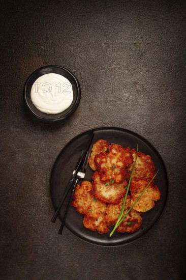 Potato pancakes, pancakes with sour cream, Belarusian dish, homemade, no people