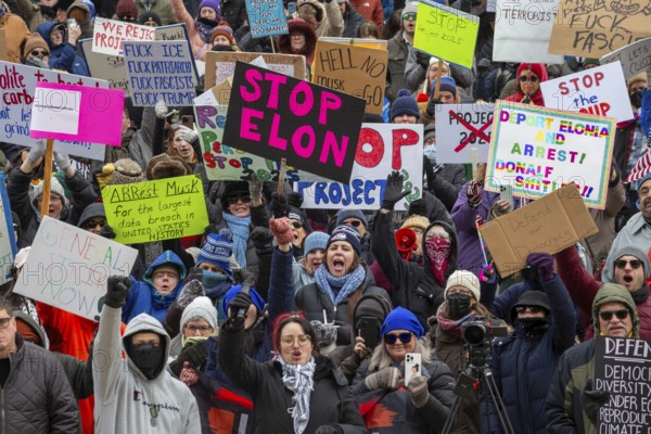 Lansing, Michigan USA - 5 February 2025 - People rally at the Michigan state capitol to oppose President Trump, Elon Musk, and Project 2025. Similar rallies were planned across the country, many of them at state capitols