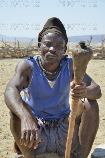 Himba man, Purros Traditional Village, Purros, Kaokoland, Kunene, Namibia, Africa