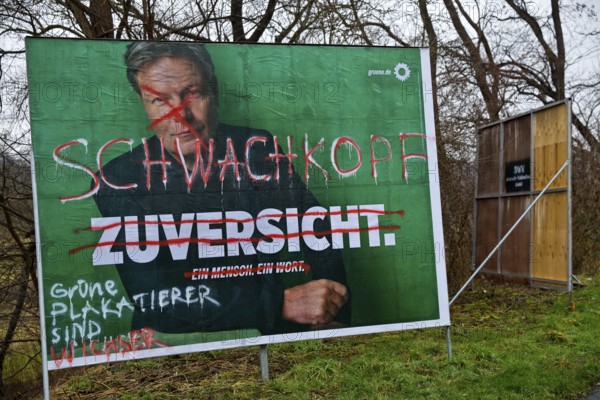 Denigration of a large poster for the 2025 federal election by the Greens with Robert Habeck, Witten, Ruhr area, Germany, Europe