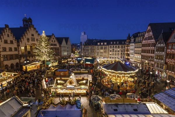 The lights of Frankfurt's Christmas market shine in the evening., Römerberg, Frankfurt am Main, Hesse, Germany, Europe