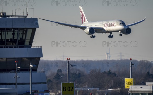 Qatar Airways aircraft approaching Düsseldorf Airport, DUS, old air traffic control tower, North Rhine-Westphalia, Germany, Europe