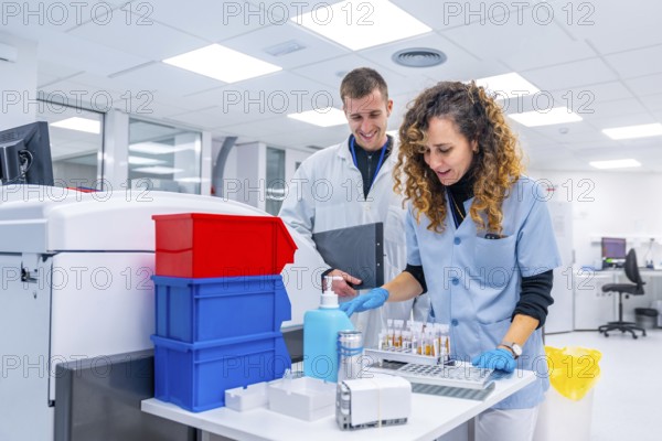 Medical staff working together with samples in the laboratory of the pathology area of an hospital