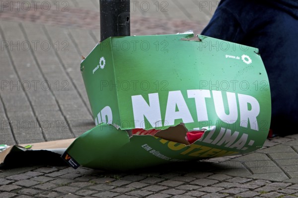 Destroyed Green Party election poster, symbolic photo for Nature on the Ground or The Greens on the Ground, Bochum, North Rhine-Westphalia, Germany, Europe