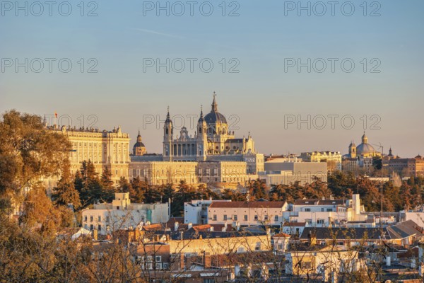 Madrid Spain, sunset city skyline at Cathedral de la Almudena with autumn foliage season