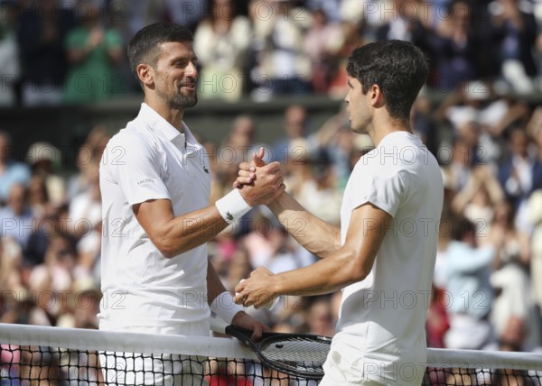 Serbian tennis p (layer Novak Djokovic congratulates the winner Carlos Alcaraz at the 2024 Wimbledon Championships, London, England.Carlos Alcaraz (ESP)