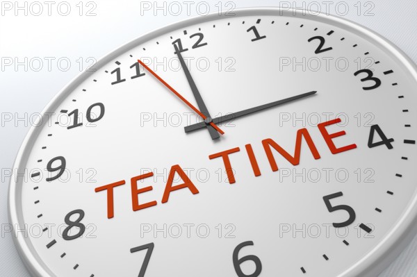 An image of a nice clock with the words tea time
