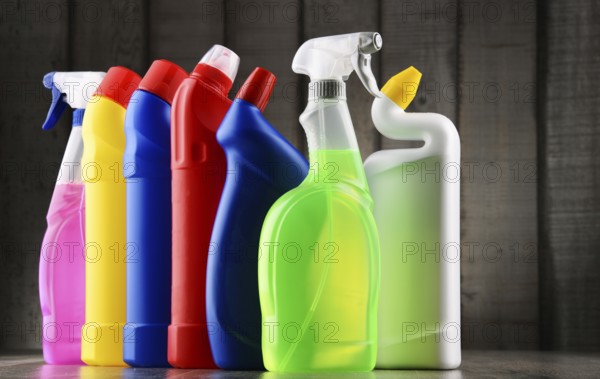 Variety of detergent bottles and chemical cleaning supplies
