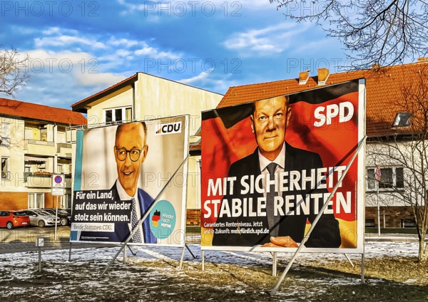 Election posters of CDU top candidate Friedrich Merz (left) with SPD top candidate Olaf Scholz (right) in Velten. The early federal election will take place on 23 February 2025