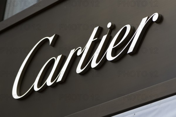 Close-up, logo of the French luxury fashion brand Cartier for jewellery and watches on a boutique in the shopping street Neuer Wall, Hamburg, Germany, Europe