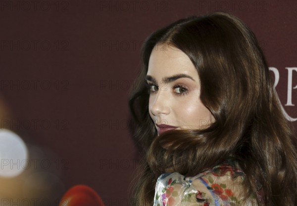 Lily Collins at the 'Les Miserables' Photo Call held at the Linwood Dunn Theater in Hollywood, USA on June 8, 2019