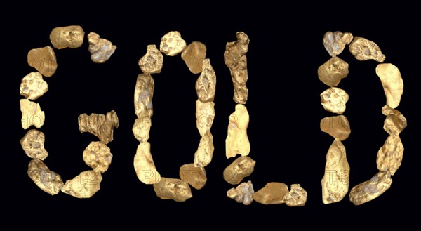 New Zealand gold nuggets arranged to spell the word GOLD