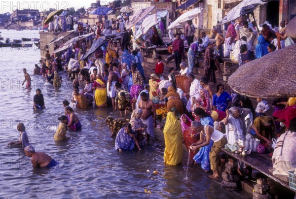 Hindu religious morning rituals in the Ganges Ganga River, Diwali festival at Varanasi Benaras, Uttar Pradesh, India, Asia