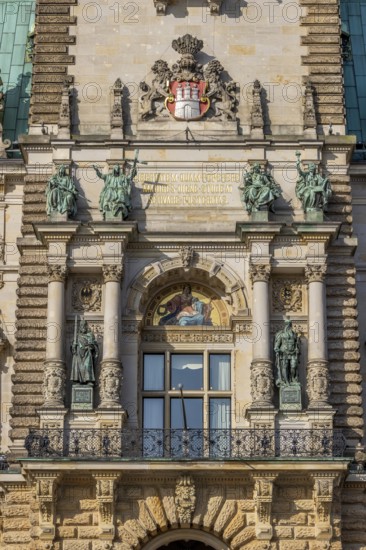 Detail facade Hamburg City Hall with city coat of arms, windows, sculptures and rich decorations on the facade, Hamburg, Land Hamburg, Northern Germany, Germany, Europe