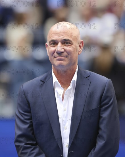 Tennis legend Andre Agassi during the Men's Singles trophy presentation at the US Open 2024 Championships, Billie Jean King Tennis Center, Queens, New York, USA, North America