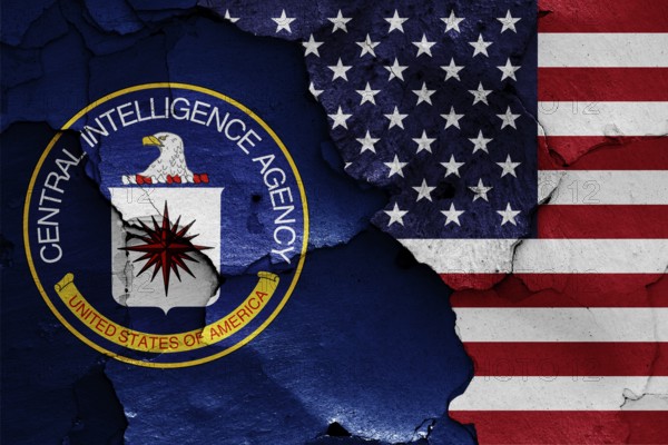 Flags of Central Intelligence Agency and USA painted on cracked wall