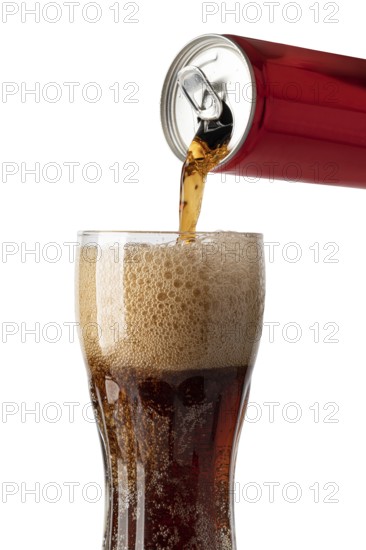 pouring cola soda drink from can to glass isolated on a white background