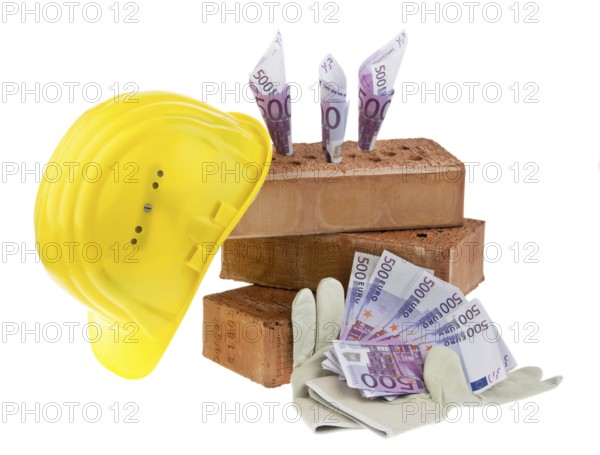 Symbolic photo house building, financing, building savings. Brick and euro, hard hat, craftsman, Vienna, Austria, Europe