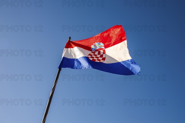 Flag of Croatia waving in the wind, Dubrovnik, Dalmatia, Croatia, Europe