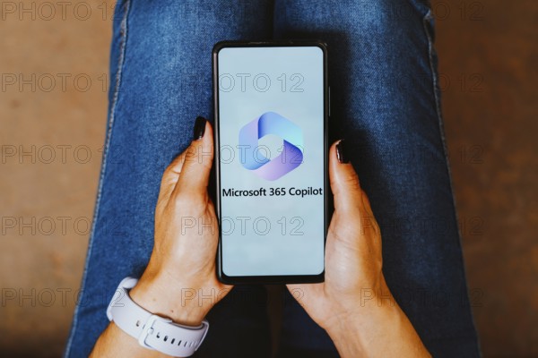 In this photo illustration, the Microsoft 365 Copilot logo is displayed on a smartphone screen