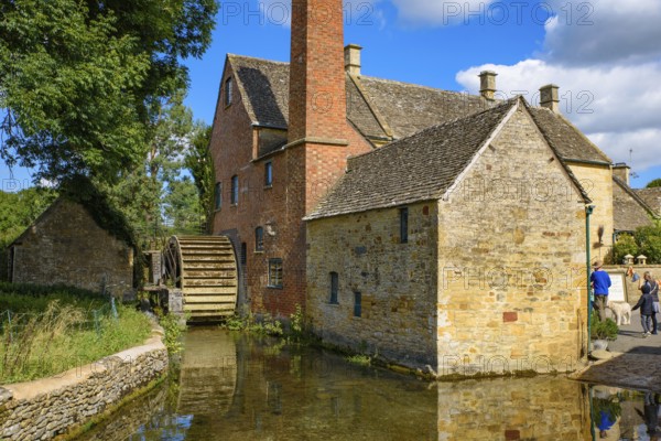 Old water mill in Lower Slaughter, a village in Cotswolds area, England, UK