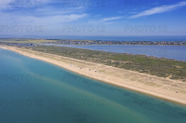 Aerial top view on sand beach, estuaries and Black sea, Anapa resort. Russia