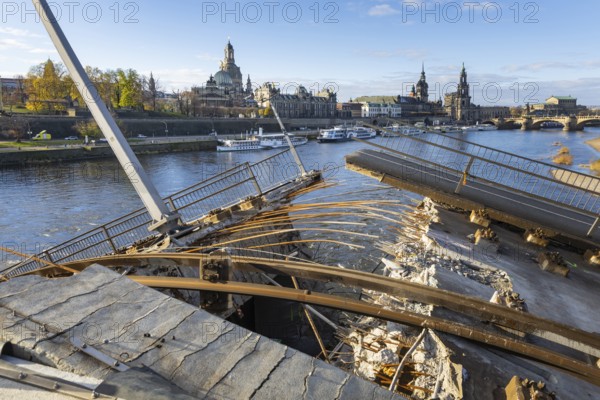 Partial collapse of the Carola Bridge. Over a length of around 100 metres, the section on which the trams normally run has collapsed into the Elbe. The demolition of the section is in full swing. Dresden, Saxony, Germany, Europe