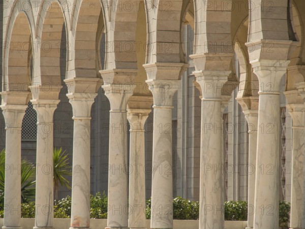 A row of marble columns and arches of a historic building, Tunis, Tunisia, Africa