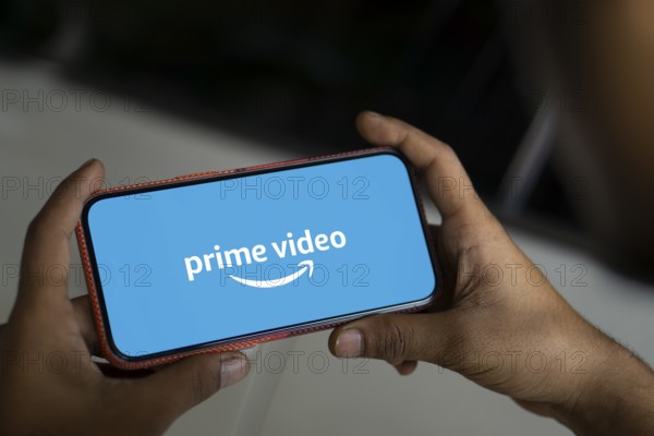 Amazon prime video logo is displayed on smartphone.